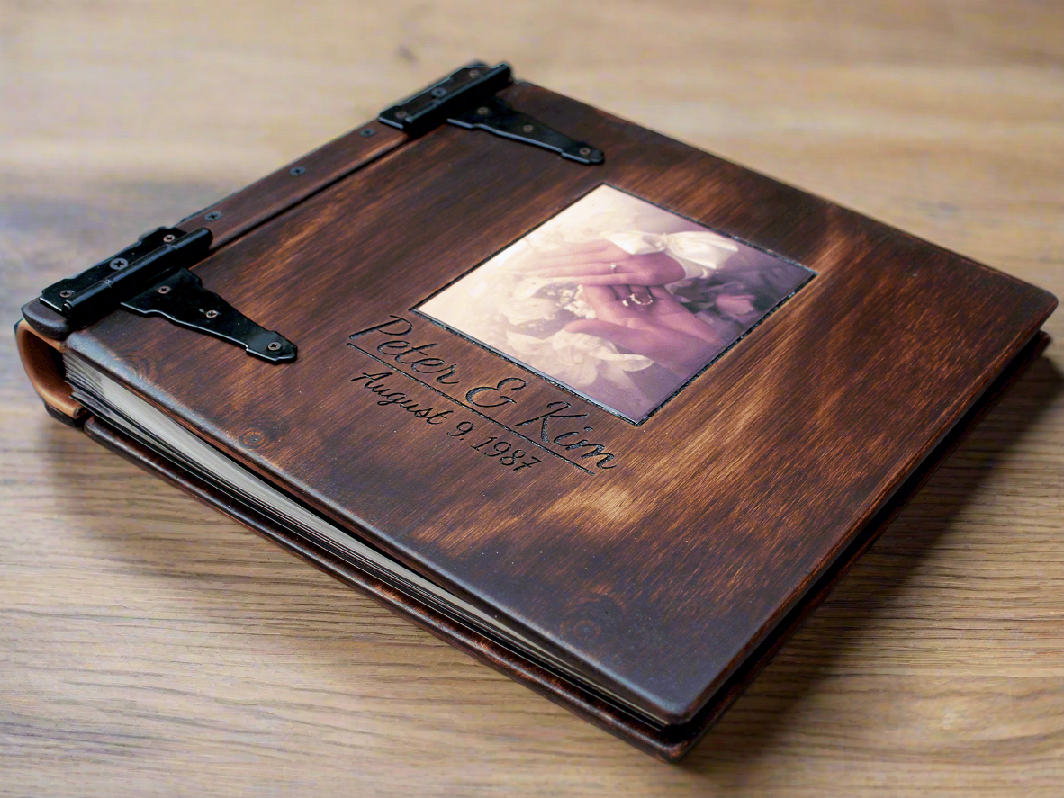 Preserve your family's legacy with a personalized family heirloom photo album from Rustic Engravings. Crafted from high-quality wood and adorned with unique engravings, this album provides ample space to showcase your most treasured memories. It's a true 